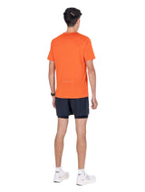 Ronhill Men's Core S/S Tee in Ronhill Red - worn, back, standing