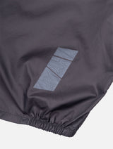Ronhill Men's Tech All-Terrain Jacket in Oxide/Ronhill Red - reflective detail