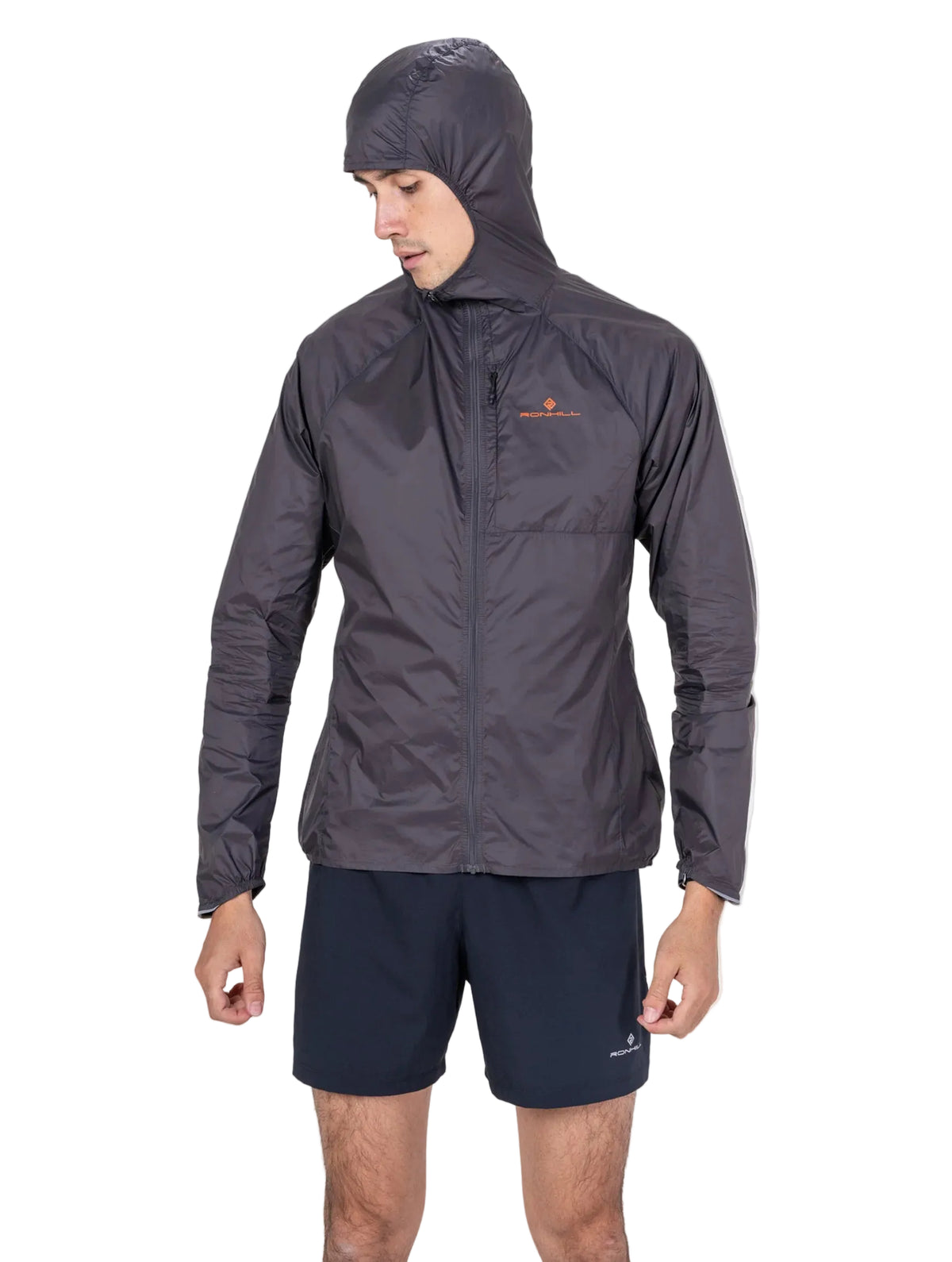 Ronhill Men's Tech All-Terrain Jacket in Oxide/Ronhill Red - worn, hood up