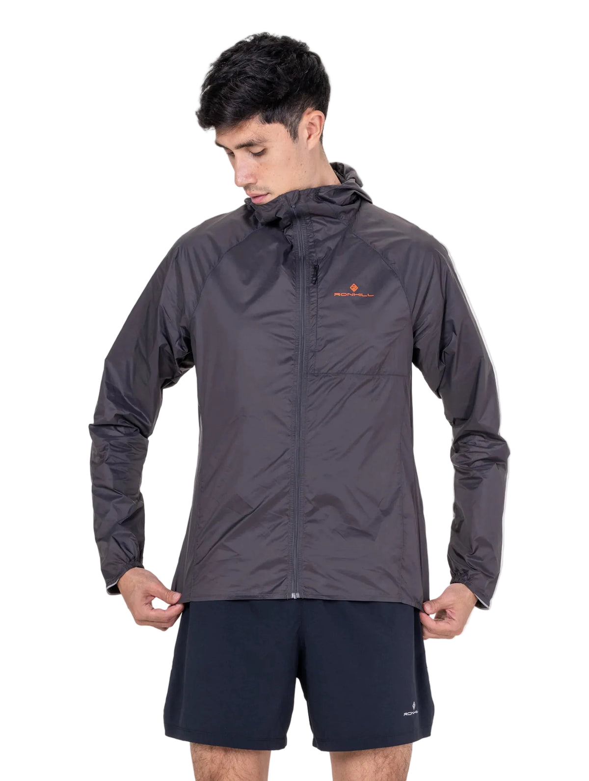 Ronhill Men's Tech All-Terrain Jacket in Oxide/Ronhill Red - worn, hood up