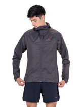 Ronhill Men's Tech All-Terrain Jacket in Oxide/Ronhill Red - worn, hood up