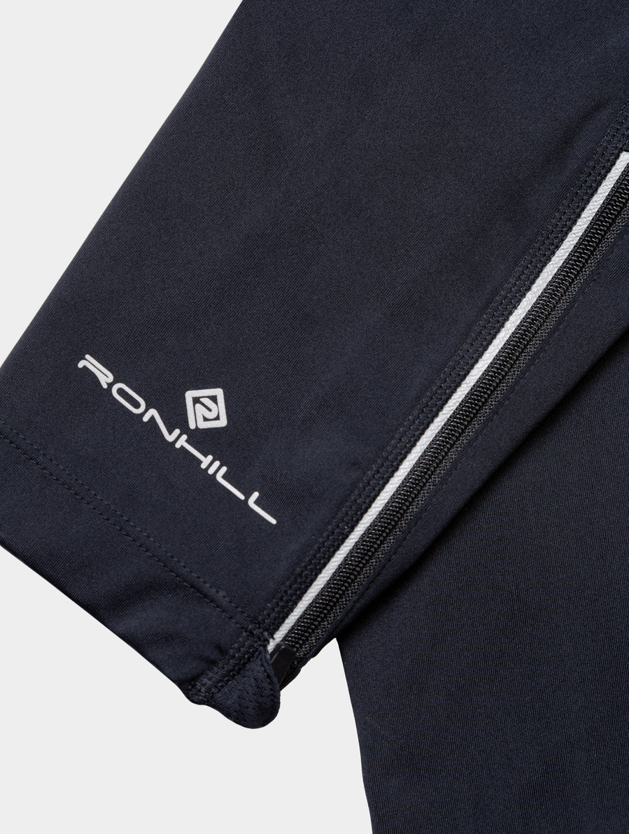 Ronhill Men's Tech Paragon Tight in All Black - ankle zip detail