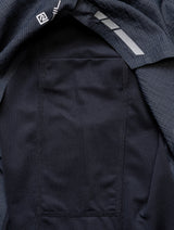 Ronhill Men's Tech Race Twin Short in All Black - thigh tuck pocket detail