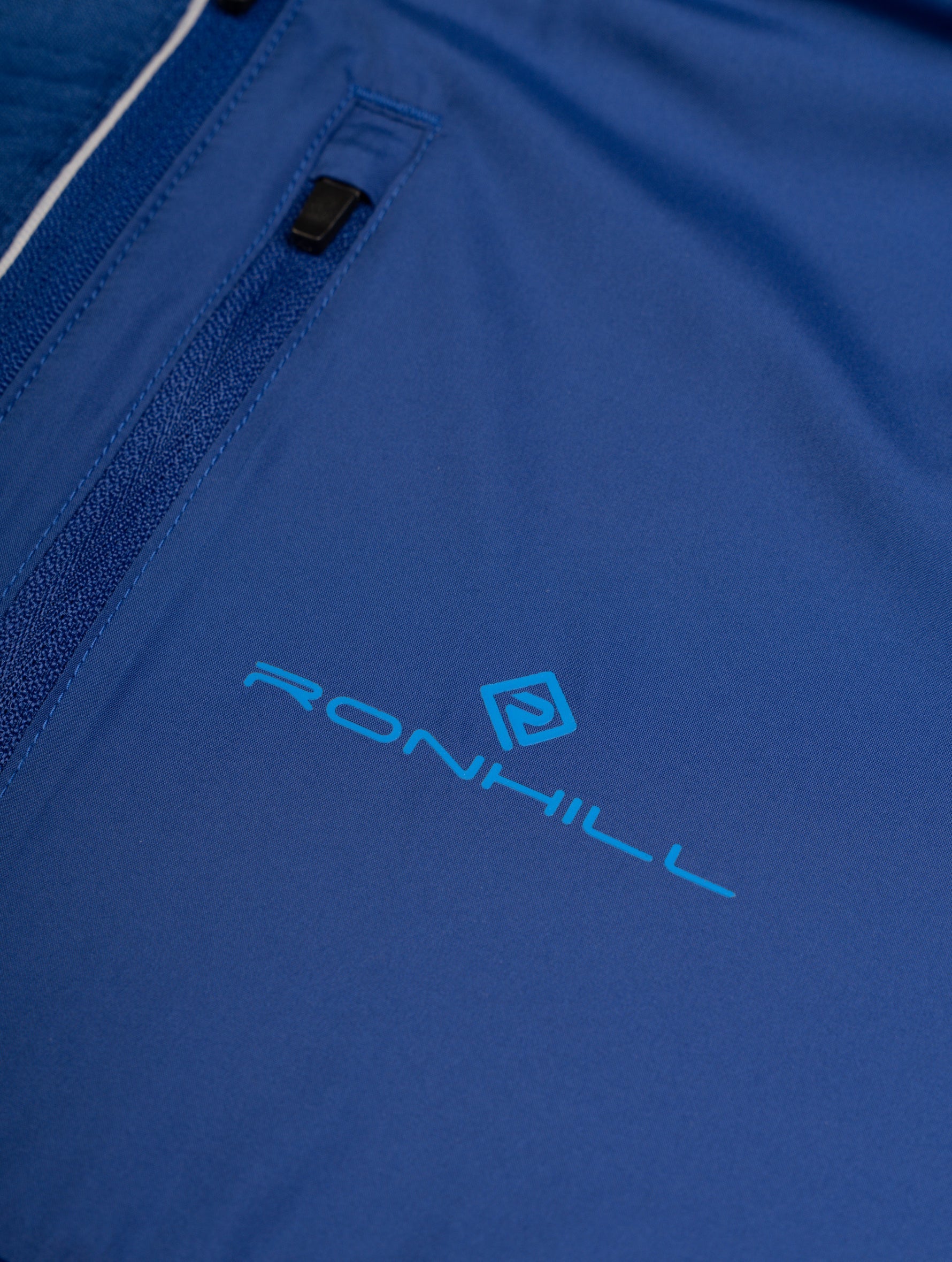 Ronhill Men's Tech Winter 1/2 Zip in Ocean/Electric Blue - brand logo detail