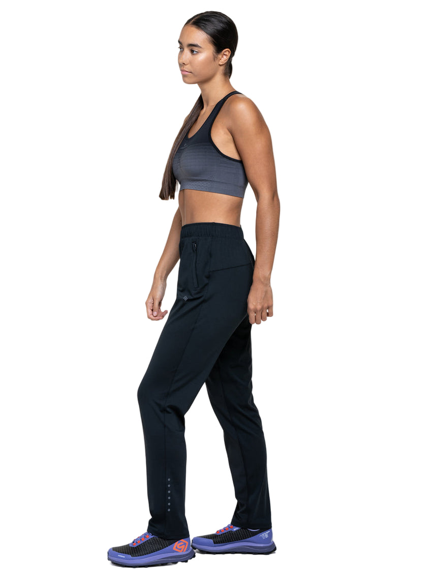 Ronhill Women's Core Slim Trackster in All Black - worn, side