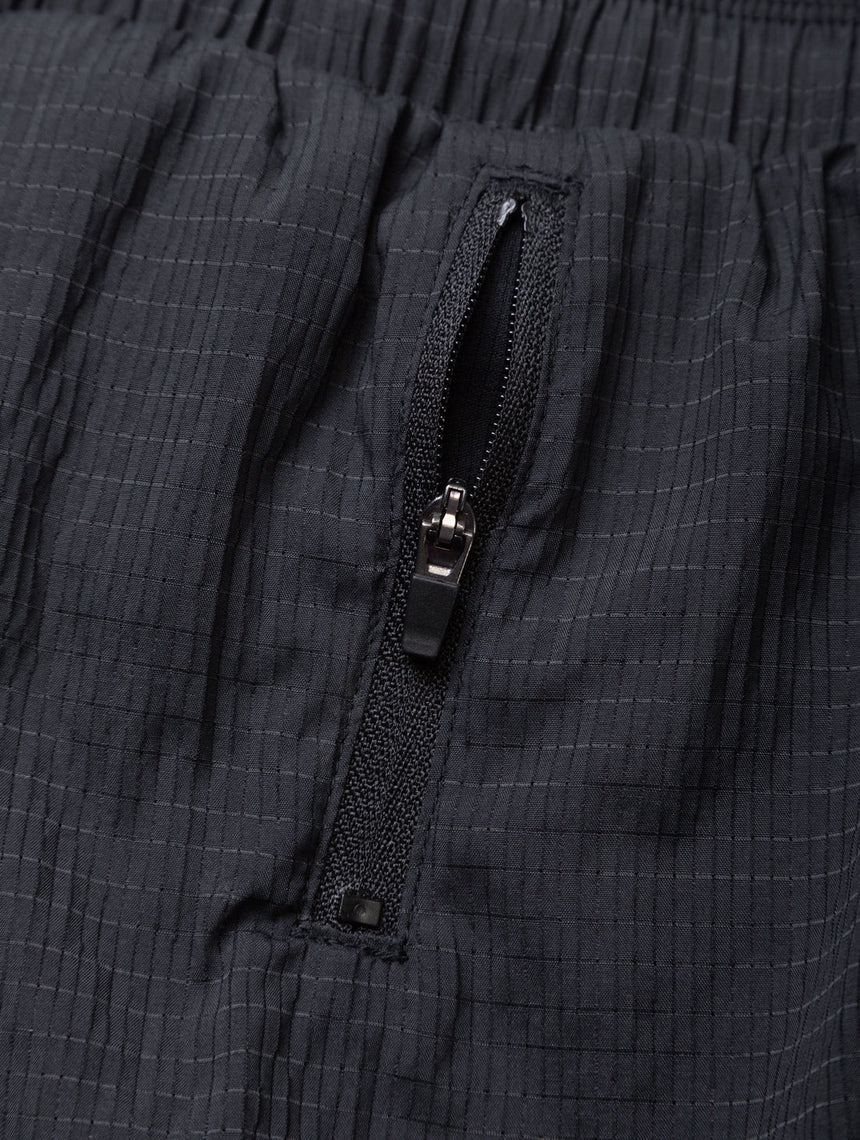 Ronhill Women's Tech Race Short in All Black - side zip pocket detail