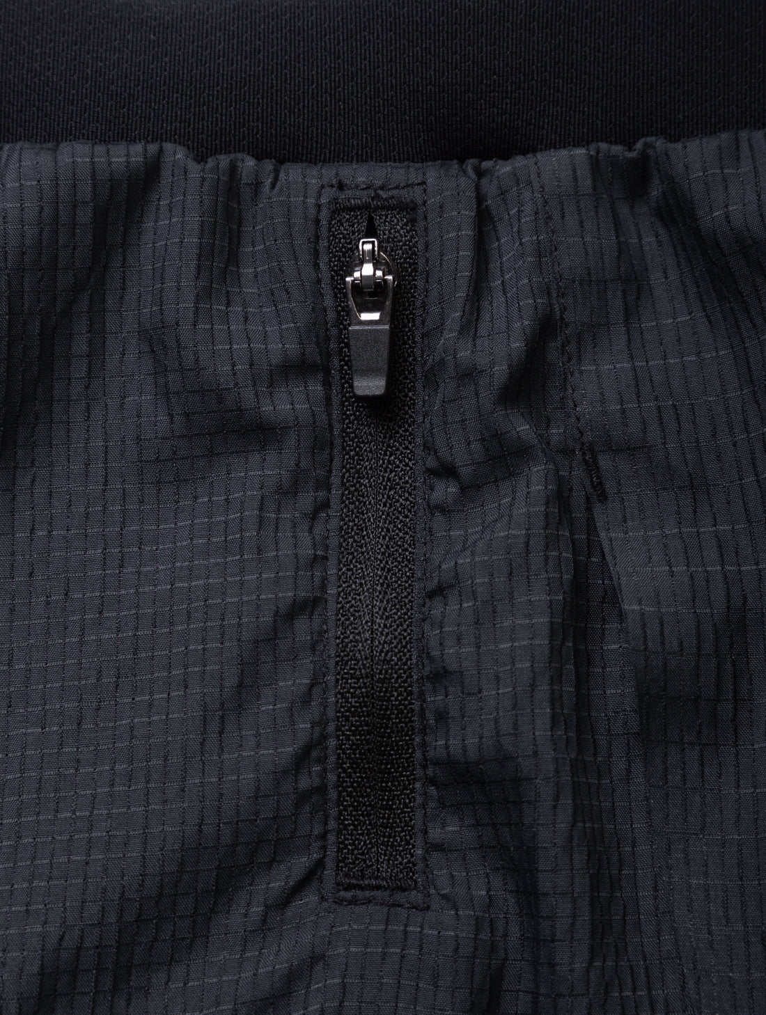 Ronhill Women's Tech Race Twin Short in All Black - side zip pocket detail