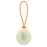 Round white device with an orange strap on a white background