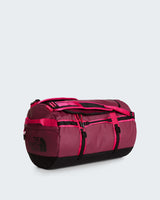 The North Face Base Camp Duffel - Small in Burgundy Crush/TNF Black - front three-quarter