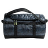 The North Face Base Camp Duffel - Small in TNF Black Glowing Topo Print - front three-quarter