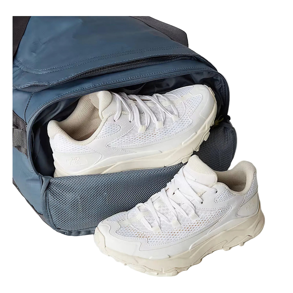 The North Face Base Camp Voyager Duffel 42L in Anthracite Grey/Pigment Yellow - shoe compartment detail