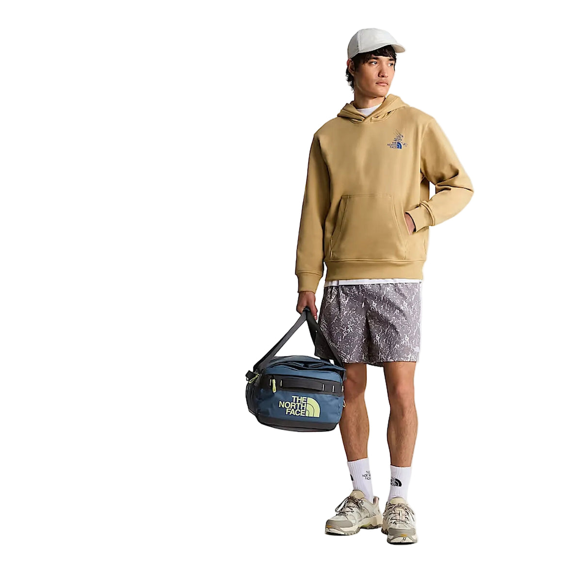 The North Face Base Camp Voyager Duffel 42L in Anthracite Grey/Pigment Yellow - worn, front, full body