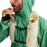 The North Face Sunriser Run Vest 8 in Desert Stone/Rust Orange - worn, front, drinking from soft flask