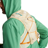 The North Face Sunriser Run Vest 8 in Desert Stone/Rust Orange - worn, front, hood up, chest detail