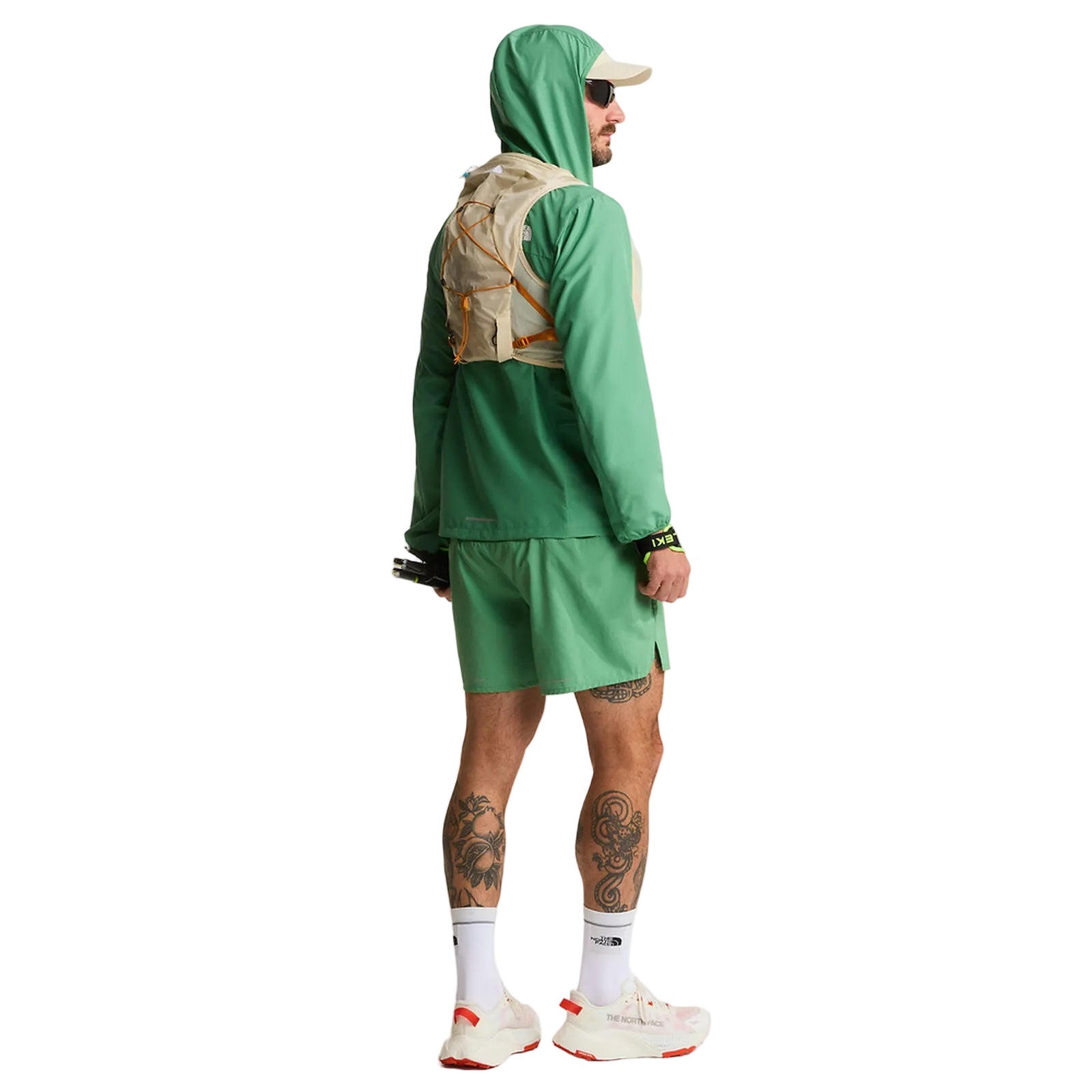 The North Face Sunriser Run Vest 8 in Desert Stone/Rust Orange - worn, side, full body