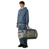 The North Face Base Camp Duffel Large Stone Slab/Gran - side view with detachable ergonomic shoulder straps and padded handles