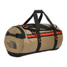 The North Face Base Camp Duffel Medium Cedar/TNF Black - lifestyle shot showing versatile backpack and duffel carry options