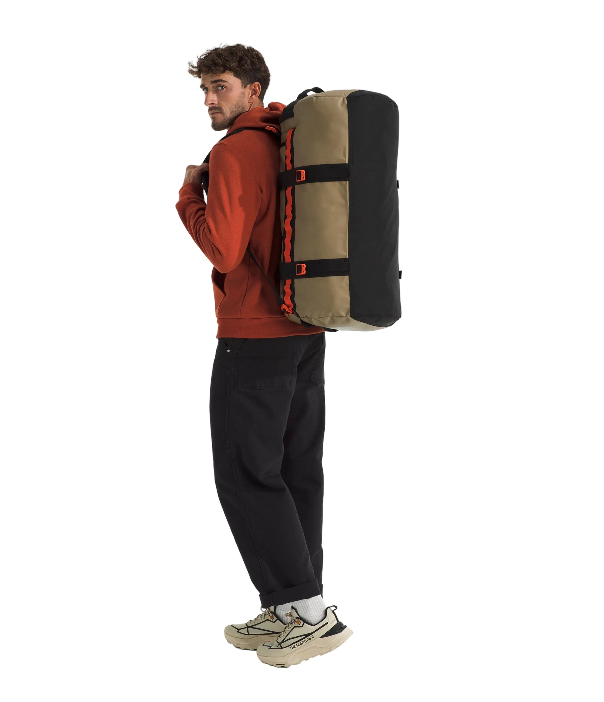 The North Face Base Camp Duffel Medium Cedar/TNF Black - side view with detachable ergonomic shoulder straps and padded handles
