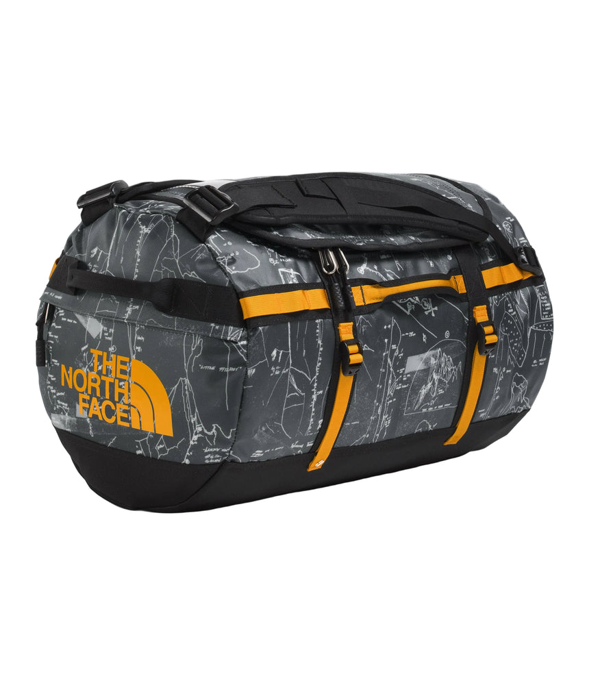 The North Face Base Camp Duffel Small 50L Anthracite Grey - lifestyle shot showing versatile backpack and duffel carry options