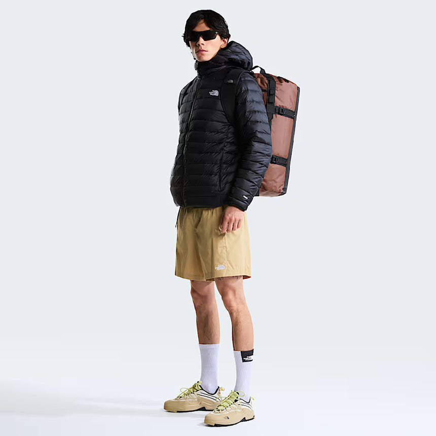 The North Face Base Camp Duffel Small 50L Ember Soil/TNF Black - lifestyle shot showing versatile backpack and duffel carry options