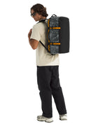 The North Face Base Camp Duffel Small Anthracite Grey - side view with detachable ergonomic shoulder straps and padded handles