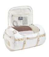 The North Face Base Camp Duffel Small White Ash/Calac - end-cap zippered compartment detail for wet clothes and gear separation