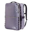 The North Face Base Camp Voyager Daypack 35L Large being used for travel, demonstrating luggage pass-through and versatile carry options