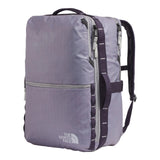 The North Face Base Camp Voyager Daypack 35L Large being used for travel, demonstrating luggage pass-through and versatile carry options