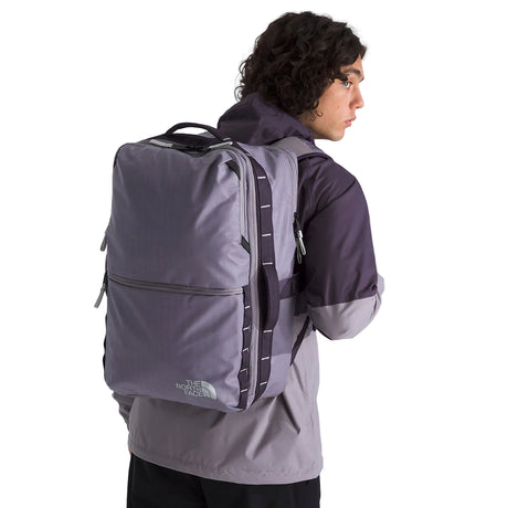 Side view of The North Face Base Camp Voyager Daypack 35L Large displaying water bottle pockets and grab handles
