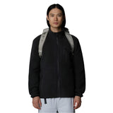 The North Face Base Camp Voyager Duffel 32L Soapstone - worn as backpack showing convertible carrying system