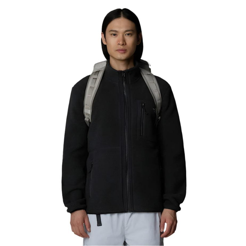 The North Face Base Camp Voyager Duffel 32L Soapstone - worn as backpack showing convertible carrying system