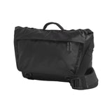 The North Face Base Camp Voyager Messenger Bag 12L front angle showing water-resistant fabric and fold-down flap design