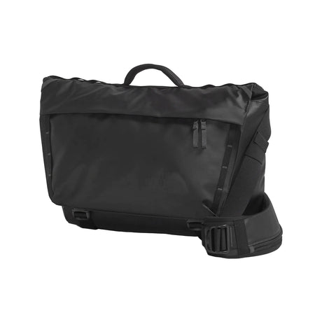 The North Face Base Camp Voyager Messenger Bag 12L front angle showing water-resistant fabric and fold-down flap design