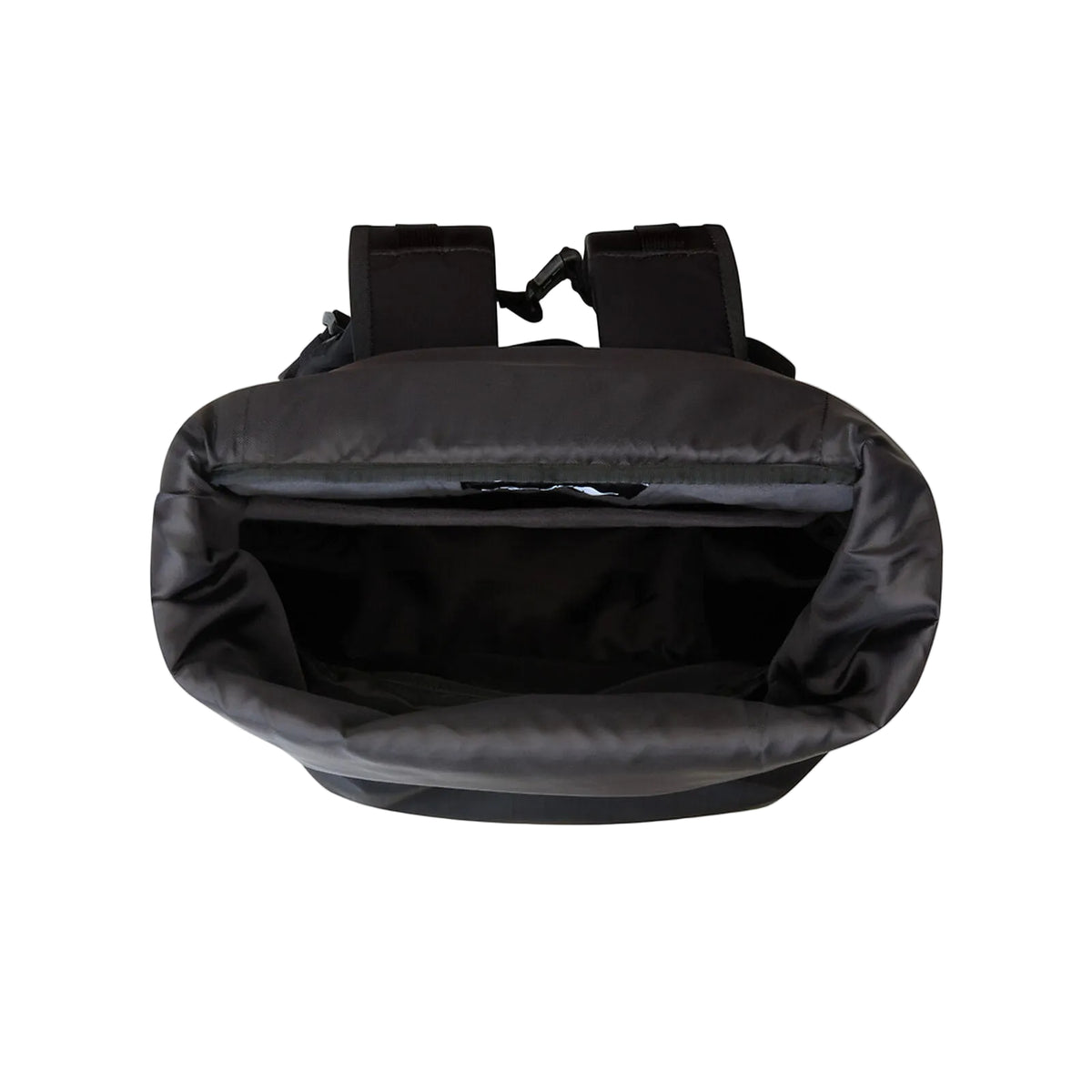 Interior view of The North Face Base Camp Voyager Roll Top Backpack showing fleece-lined laptop compartment