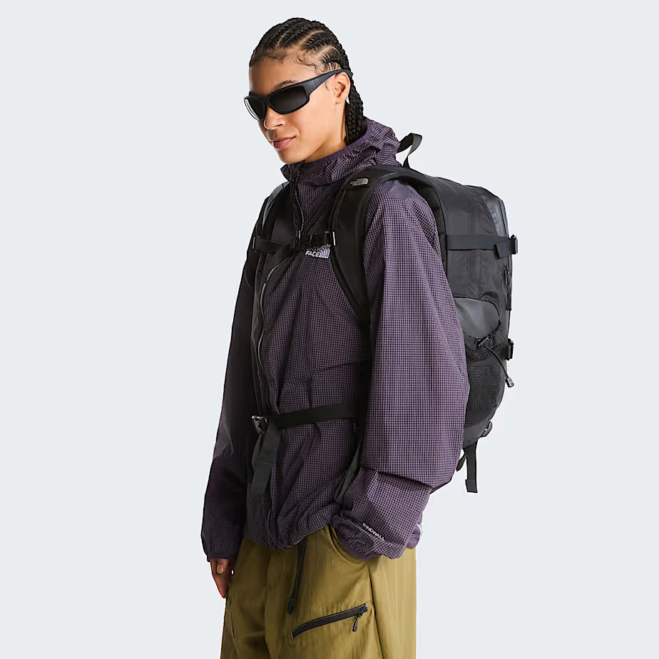 The North Face Hot Shot Base Camp Backpack 25.5L being worn for daily commute, demonstrating comfortable carry