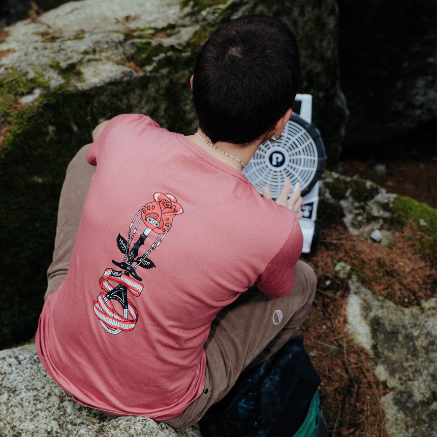 Wild Country Climbing Stamina Women's T-Shirt Mallow - Model Sitting on Rock