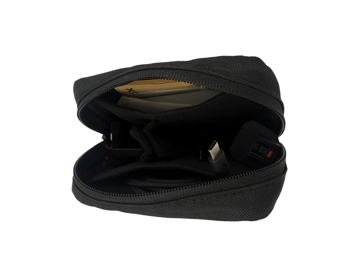 Black hard-shell travel case on a white background
