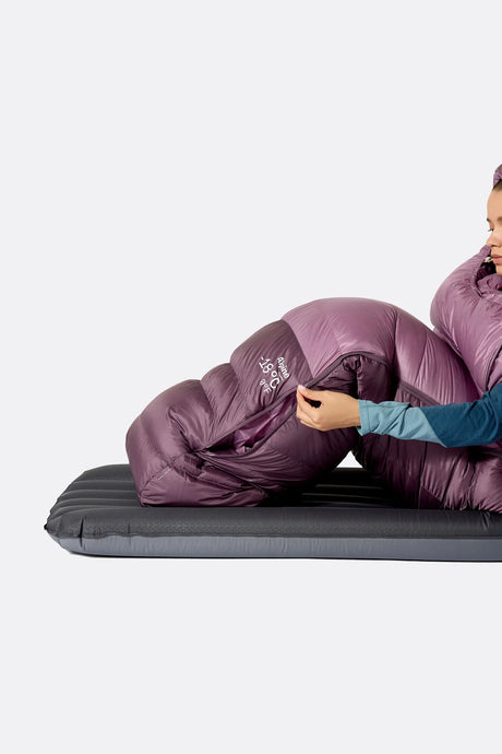 Rab Women's Alpine Down Sleeping Bag (-18°C/0F) in Iris/Dark Iris - worn, side sleeping