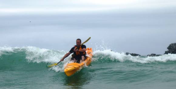 Mission CATCH 420 EXP kayak, kayak paddling through surf