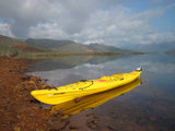 Mission ECO NIIZH 565 (XLT) kayak, Yellow kayak beside a lake