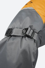 Close-up of a grey and orange jacket with a black buckle on a white background