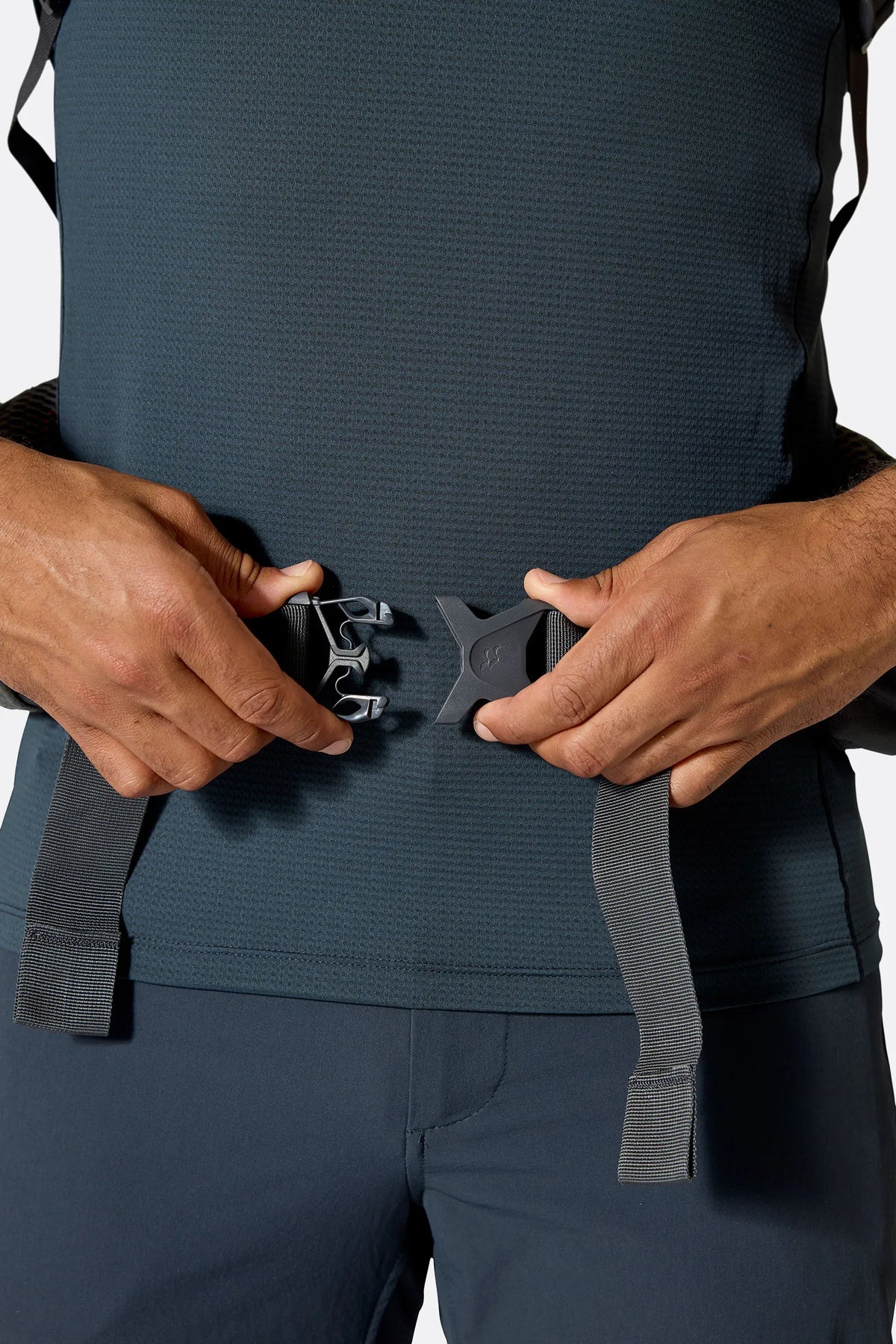Rab Hyperon 65L Trekking Pack in Dark Pewter/Anthracite - hipbelt buckle, worn