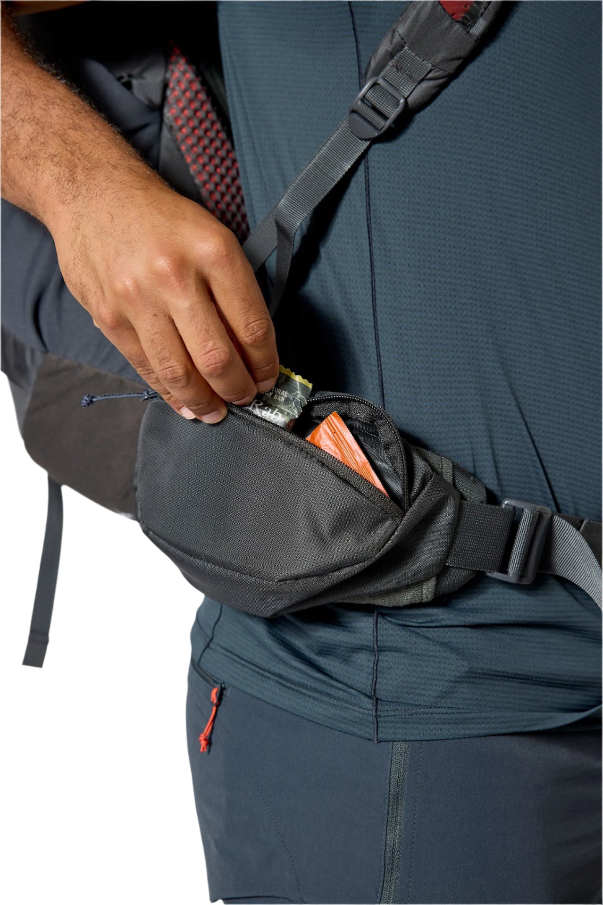 Rab Hyperon 65L Trekking Pack in Dark Pewter/Anthracite - hipbelt pocket, worn