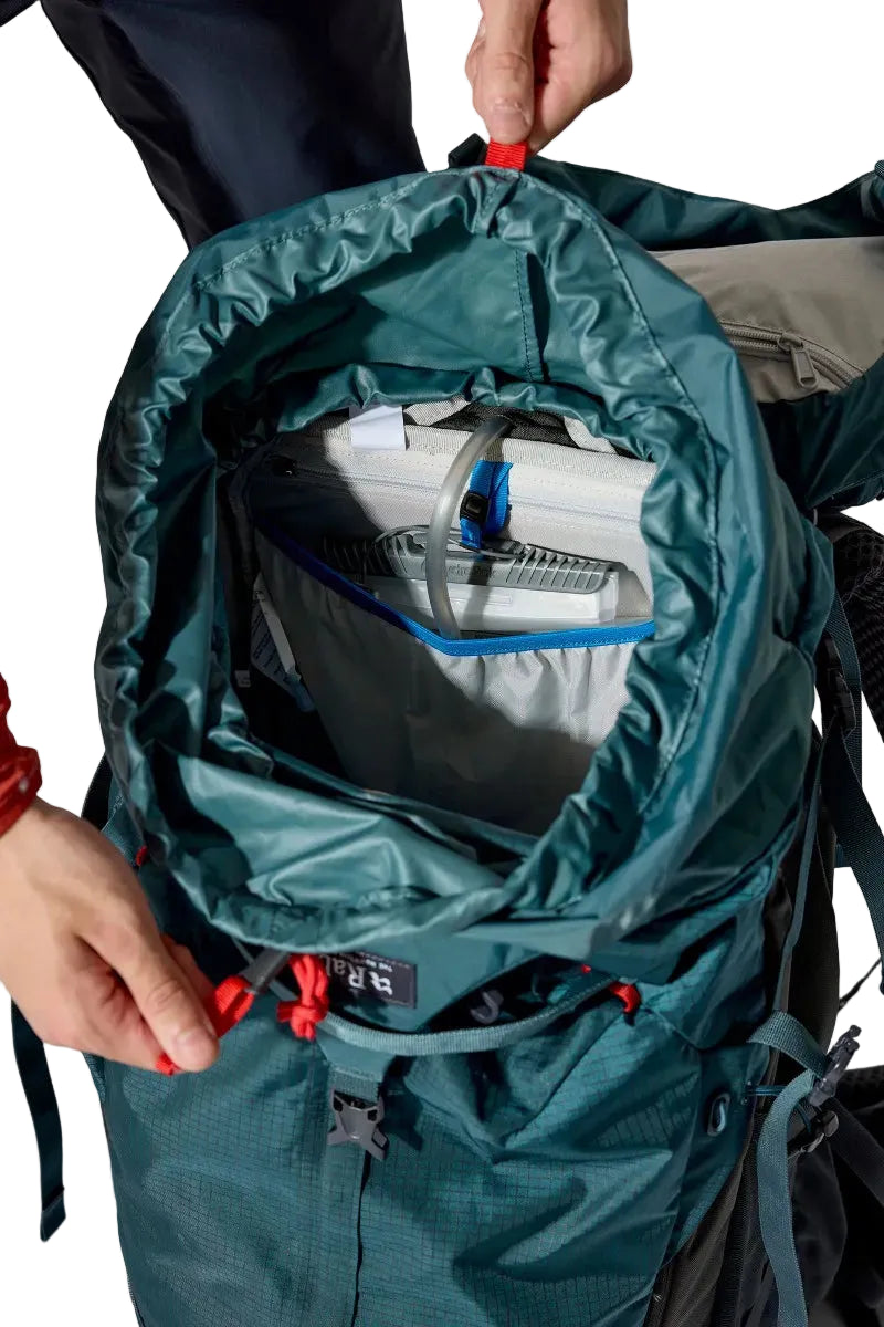 Rab Hyperon 80L Trekking Pack in Orion Blue/Anthracite - roll-top closure, worn