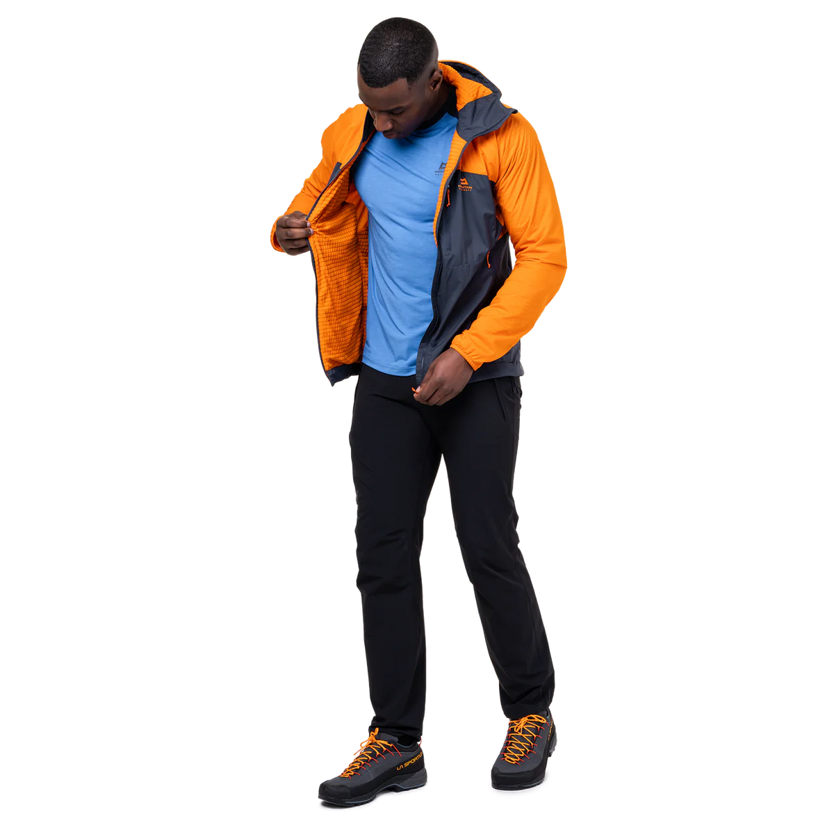 Mountain Equipment Aerotherm Men's Jacket in Blue Nights/Ember - packed into hand pocket showing twin karabiner carry loops