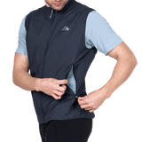 Mountain Equipment Aerotherm Men's Vest in Blue Nights - packed into hand pocket showing twin karabiner carry loops