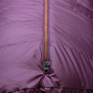 Mountain Equipment Classic Eco 300 Women's Sleeping Bag in Raisin with storage cube showing packable recycled down insulation