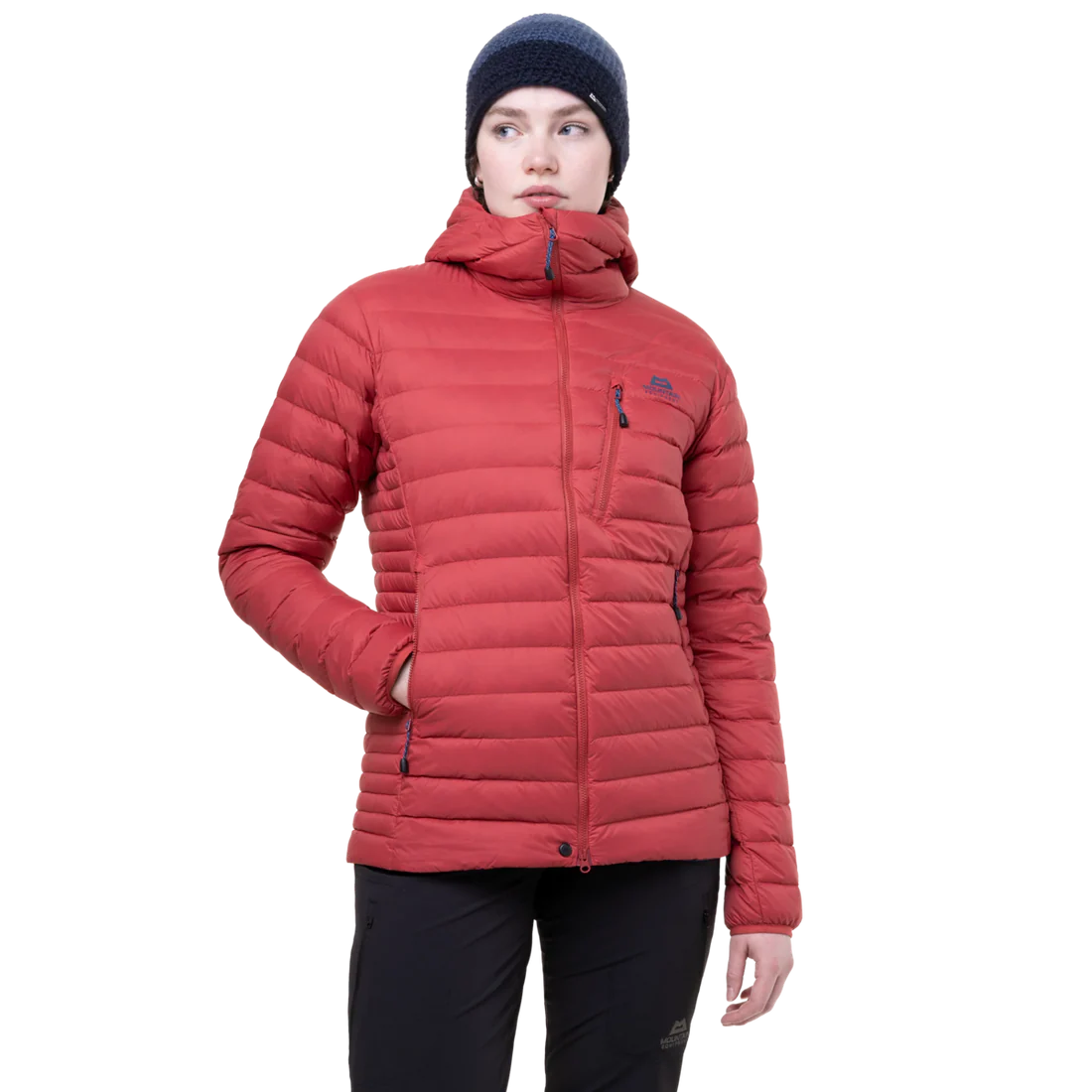Zipped hand warmer pocket detail on Mountain Equipment Earthrise Hooded Women's Jacket in Rosewood