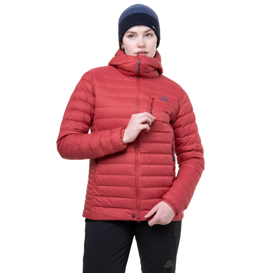 Mountain Equipment Earthrise Hooded Women's Jacket in Rosewood packed into hand pocket showing twin karabiner carry loops