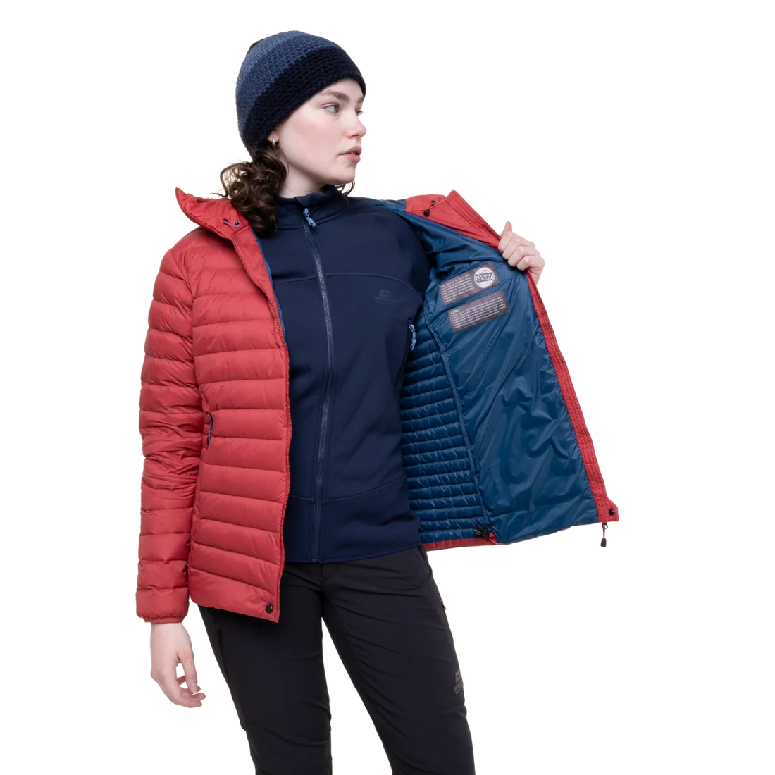 Mountain Equipment Earthrise Hooded Women's Jacket in Rosewood - lifestyle view showing lightweight recycled down insulation for ski touring and alpine climbing